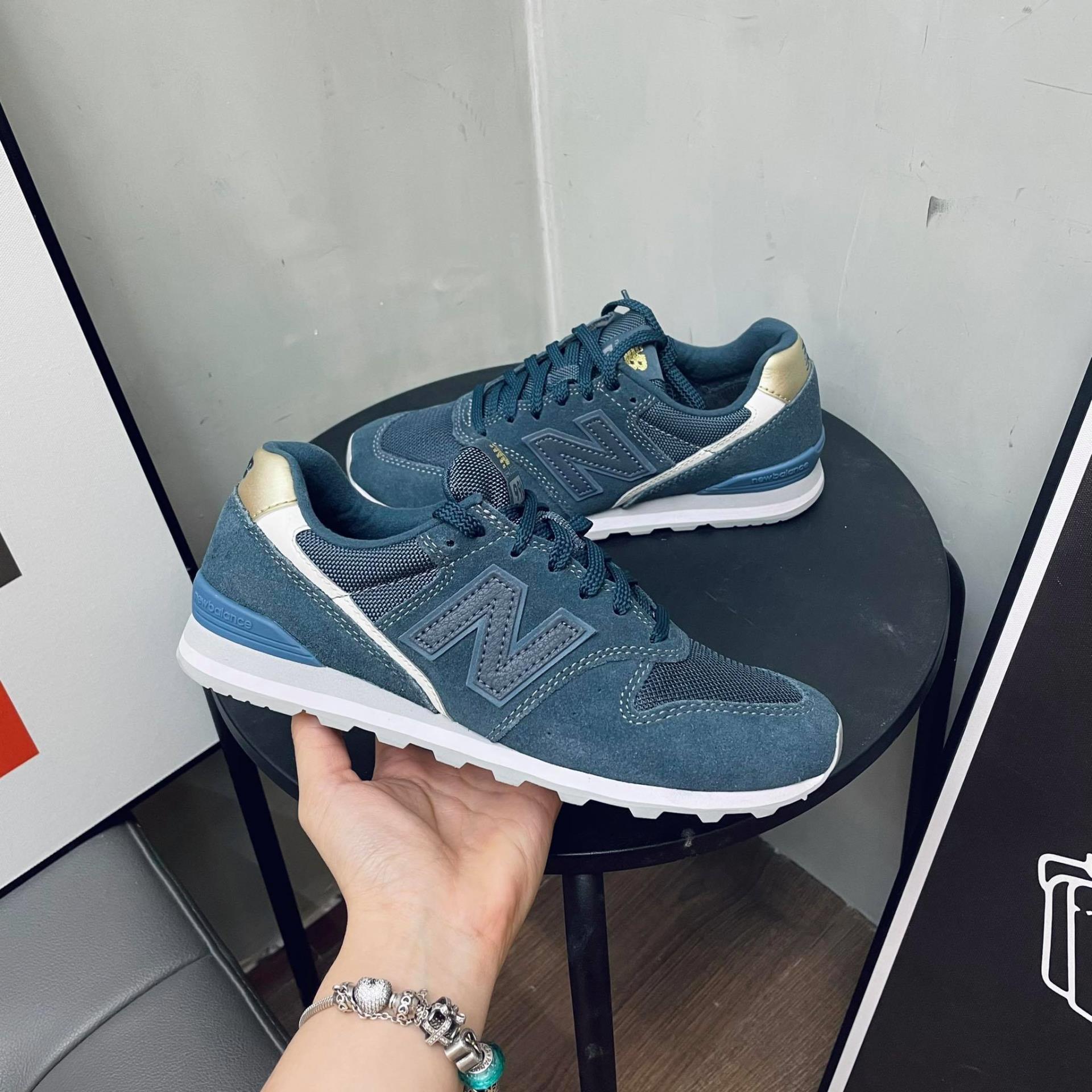 new balance navy gold