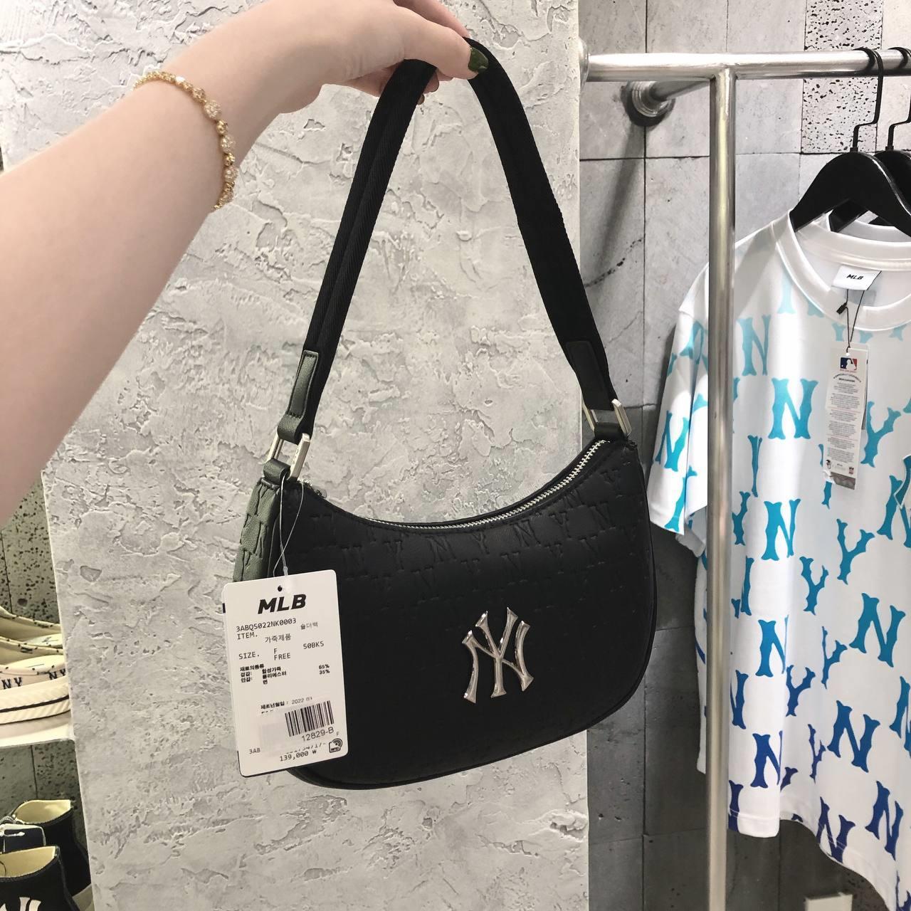 mlb monogram embossed hobo bag