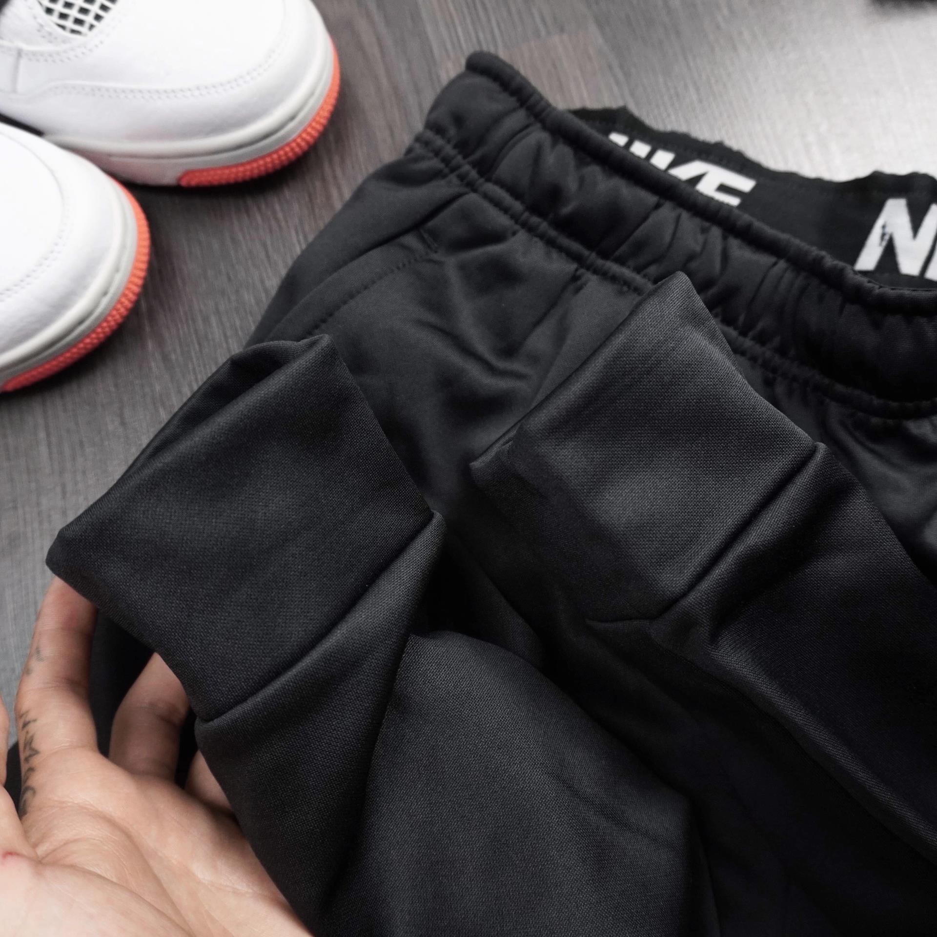 Nike Men's Dri-FIT Dry Graphic Tapered Training Pants in KSA | SSS